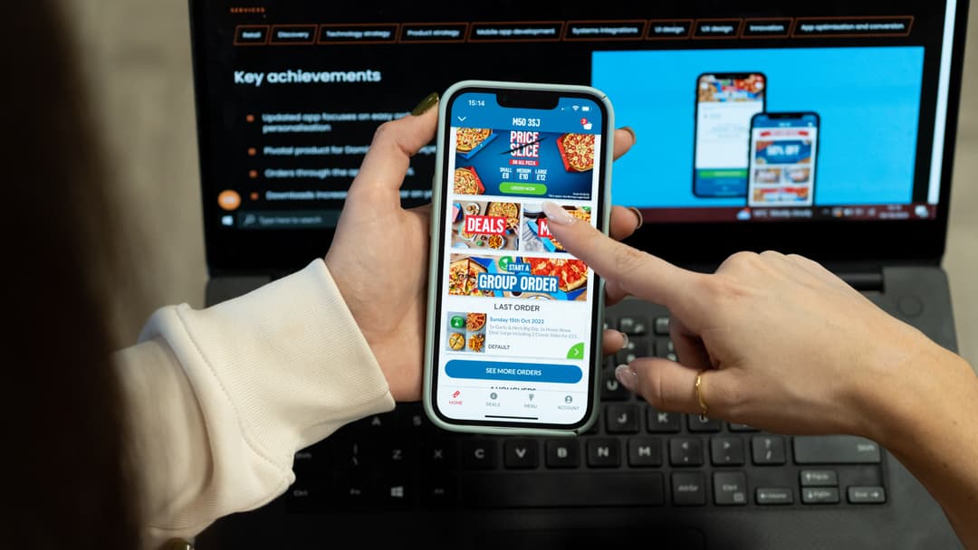 Close up photo of Domino's app in use