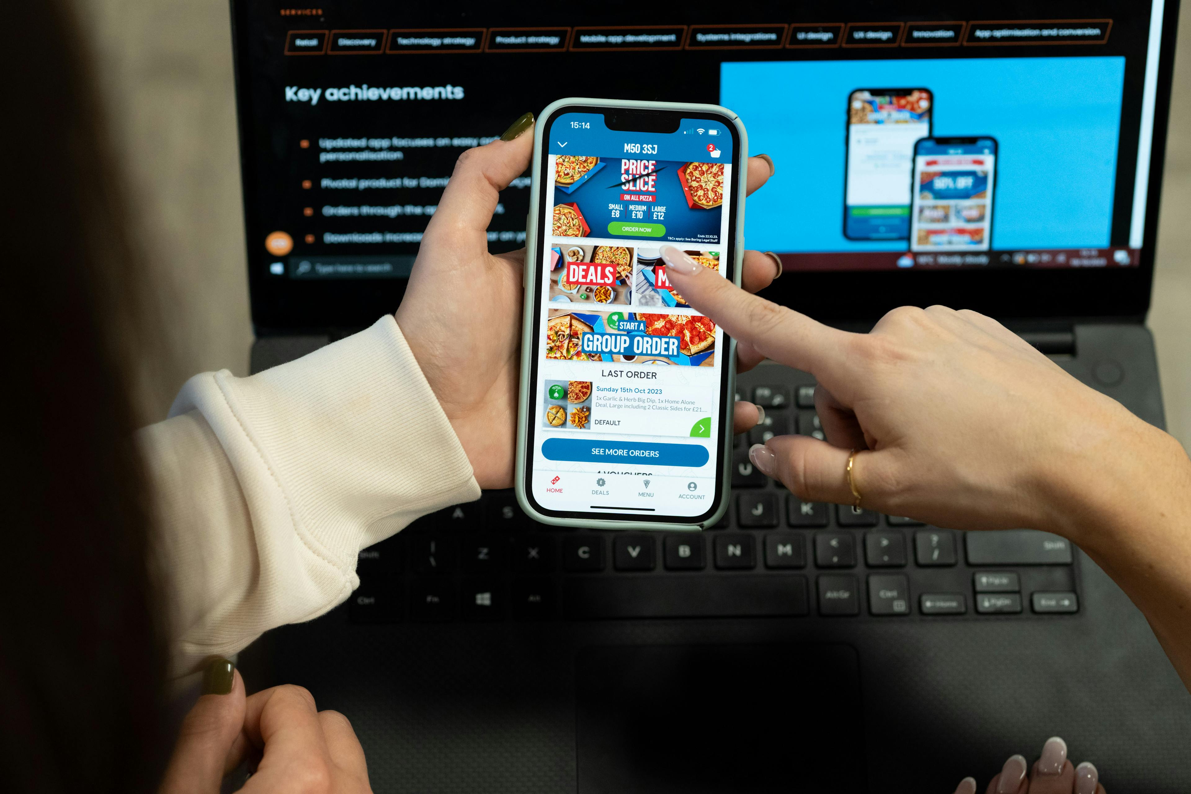Close up photo of Domino's app in use