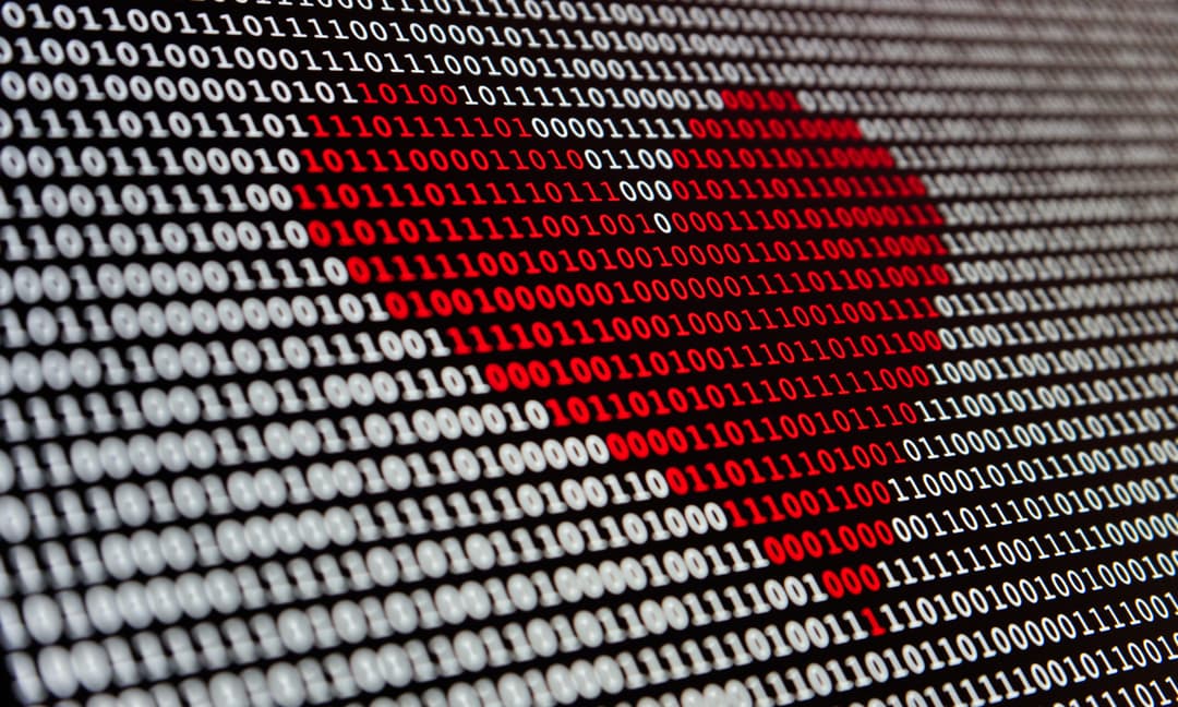 Binary code creating a heart