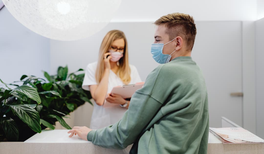 A boy wearing a medical mask