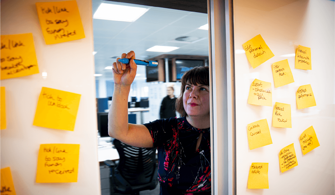 A woman writing notes