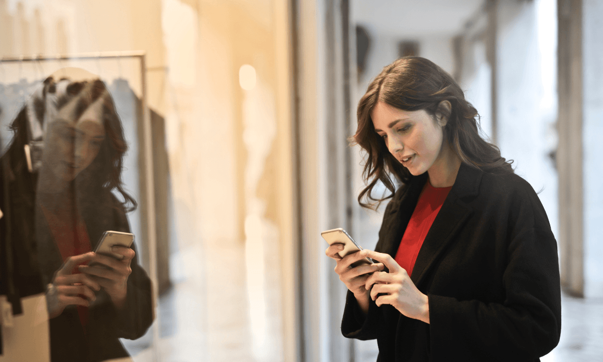 A woman looking at her phone