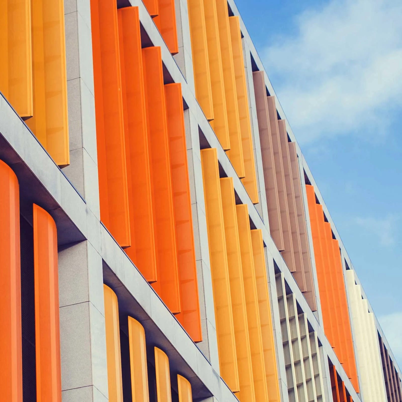 A building's façade in Apadmi brand colours