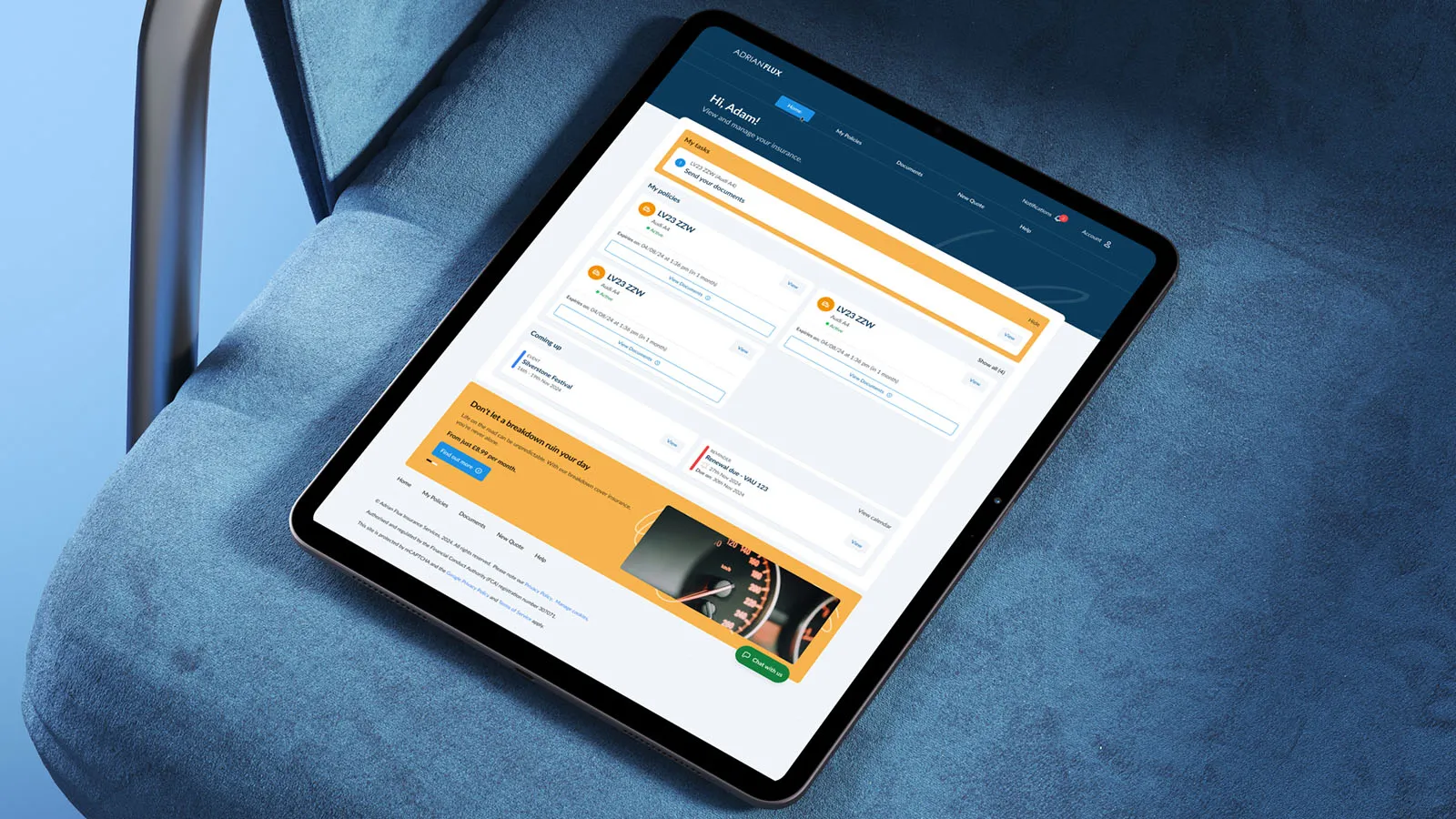 Tablet displaying a colourful web dashboard with search fields, listings, and orange highlights rests on a blue upholstered chair.